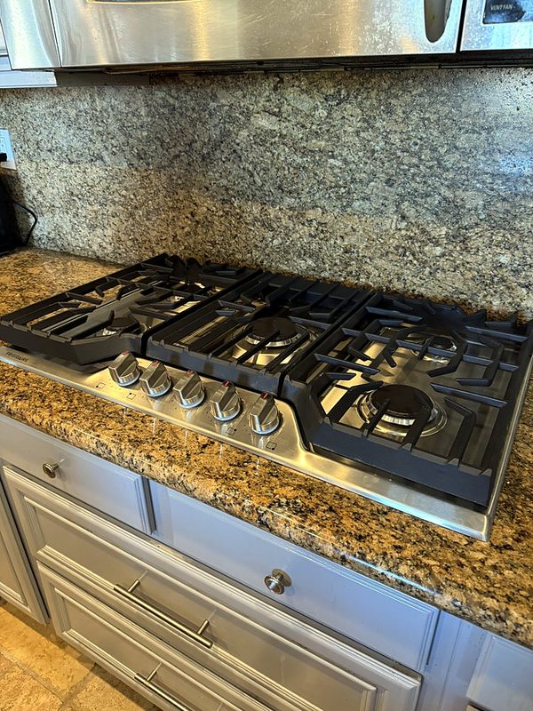 Cooktop installation in a granite countertop