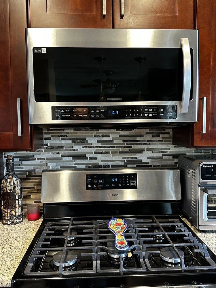 Over-the-range microwave and range installed